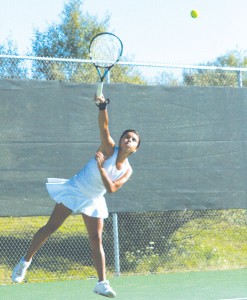 Senoir Daniel Dimas <span class='credit'>Photo By: Kate Dupon | Photographer</span><span class='description'>Senoir Daniel Dimas practicing her swing. Dimas moved to Big Rapids from Mexico City and has persevered through the language and cultural barriers along with a back injury that kept her from playing tennis for a majority of last season.</span>