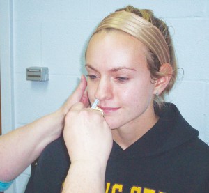 Blair McCarty gets vaccinated for H1N1 virus at Birkam Health Center. Birkam is going through its second shipment of the vaccine. It can be received through the nose or as a shot. Photo by Dan Hamilton | News Editor