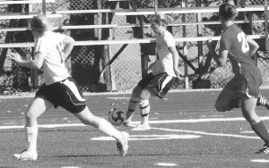 Women’s Soccer: Junior Kara Lovelace (#19) goes for the goal in the Great Lakes Intercollegiate Athletic Conference match last week against Saginaw Valley State. The Bulldogs lost 3-0, contributing toward their final conference record of 3-10-1. Photo By: Kristyn Sonnenberg | Photo Editor