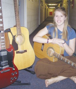 Students Rock: Selena Brown, a Freshman in the pre-pharmacy program grew up around music and has been playing guitar since the age of eight. Photo By: Kristyn Sonnenberg | Photo Editor