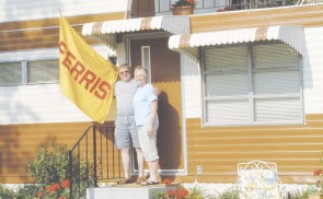 Hollywood, Mich.: Ferris State professor Greg Denny and his wife outside their home in Lake Leelanau, where parts of the movie “Youth in Revolt” was filmed. Photo Courtesy of Greg Denny