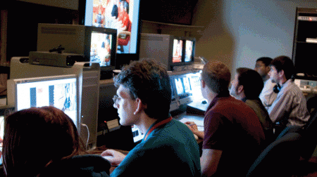 Lights, Camera, Action!: Students in the TV production class produce a live show from the control room by implementing transitions, switching between cameras and placing names of participants on the screen. Photo By: Kate Dupon | Photo Editor