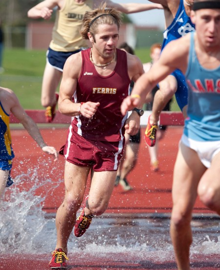 Season Beginning: Bulldog runners Steve Neshkoff, above, and Justin Price, below, during a meet in spring 2010. The Bulldogs 2011 outdoor season begins April 2. Photos Courtesy by Ferris State Athletics