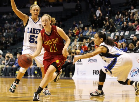 Falling Short: Becci Houdek dribbles past two GVSU players during the 131 Showdown on Jan. 29. The Bulldogs fell to the Lakers 69-62. Photo By: Brock Copus | Photographer