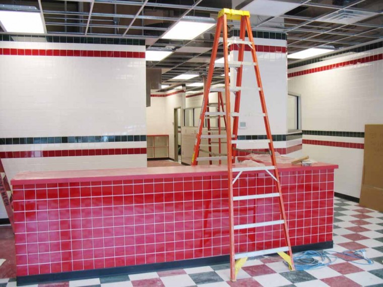 Jets Pizza: The Jets Pizza scheduled to open at 215 Maple St. is nearing completion. Beginning in June, the project is scheduled for completion in August. Jets Pizza will replace the previous Papa Johns, which shut down after a building fire Sept. 15, 2010. Photo By: Antonio Coleman | Editor in Chief 