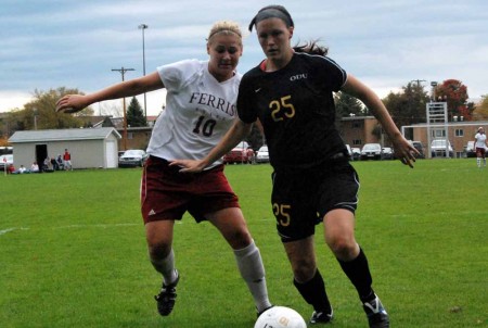 Rough Start: Bri Borgman, senior forward, battles with an opponet during a 2010 season game. The Bulldogs lost their first two games of the 2011 season. Torch File Photo