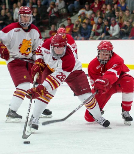 Scoring Big : FSU junior left wing Kyle Bonis keeps the puck away from a Miami (Ohio) player Oct. 21. Bonis has already scored six points in six games for the 2011-12 season.  Photo By: Brock Copus | Multimedia Editor 