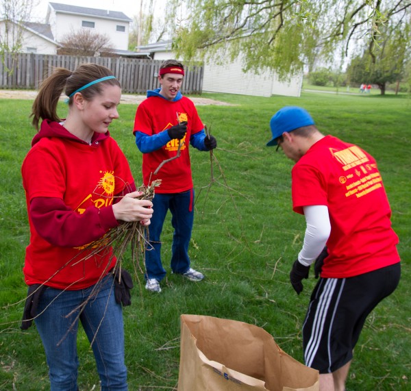 Giving Back: Ferris students Sarah Fredricks, Chris Jones, and Steve Wetter, left ot right, volunteered during the Big Event on April 14. Over 1,600 students helped to spruce up the Big Rapids community.  Photo By: Brock Copus | Multimedia Editor