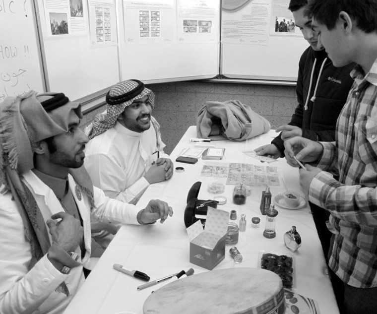Explaining Culture: Student representives from Sauid Arabia explain various aspects of life to visitors of the International Festival of the Arts. Photo By: Brock Copus | Multimedia Editor
