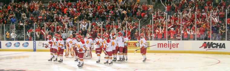 The Bulldogs celebrate Mayhew's second goal of the night, the game winner in overtime (Photo By Brock Copus, Multimedia Editor)