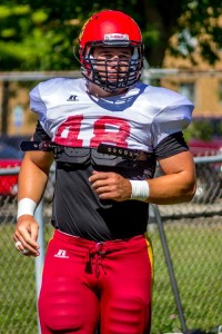 Ferris State’s Justin Zimmer rests in between individual defensive lineman drills during one of the Bulldogs many pre-season practices.