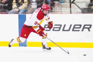 Senior forward, Dom Panetta, handles the puck out of his defensive zone, earlier this season. Panetta has missed the last four games due to injury, and his status remains unknown.