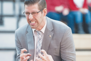 Men’s Basketball head coach Andy Bronkema expresses himself on the sideline during a Ferris State Victory.