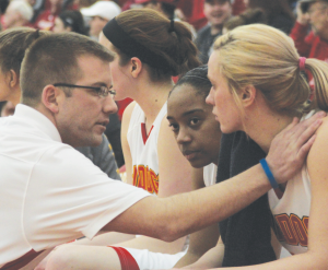 Assistant Coach Shea Mead talks to members of the Woman’s Basketball team earlier this season.