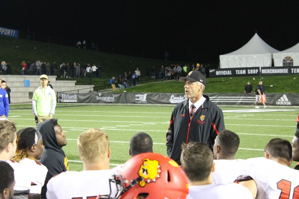 Head Coach Tony Annese addresses his team just before the Anchor-Bone Trophy is presented.