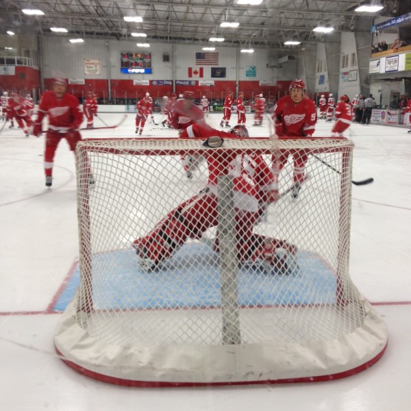 Detroit goaltender Jimmy Howard makes a glove save during warm-ups. 