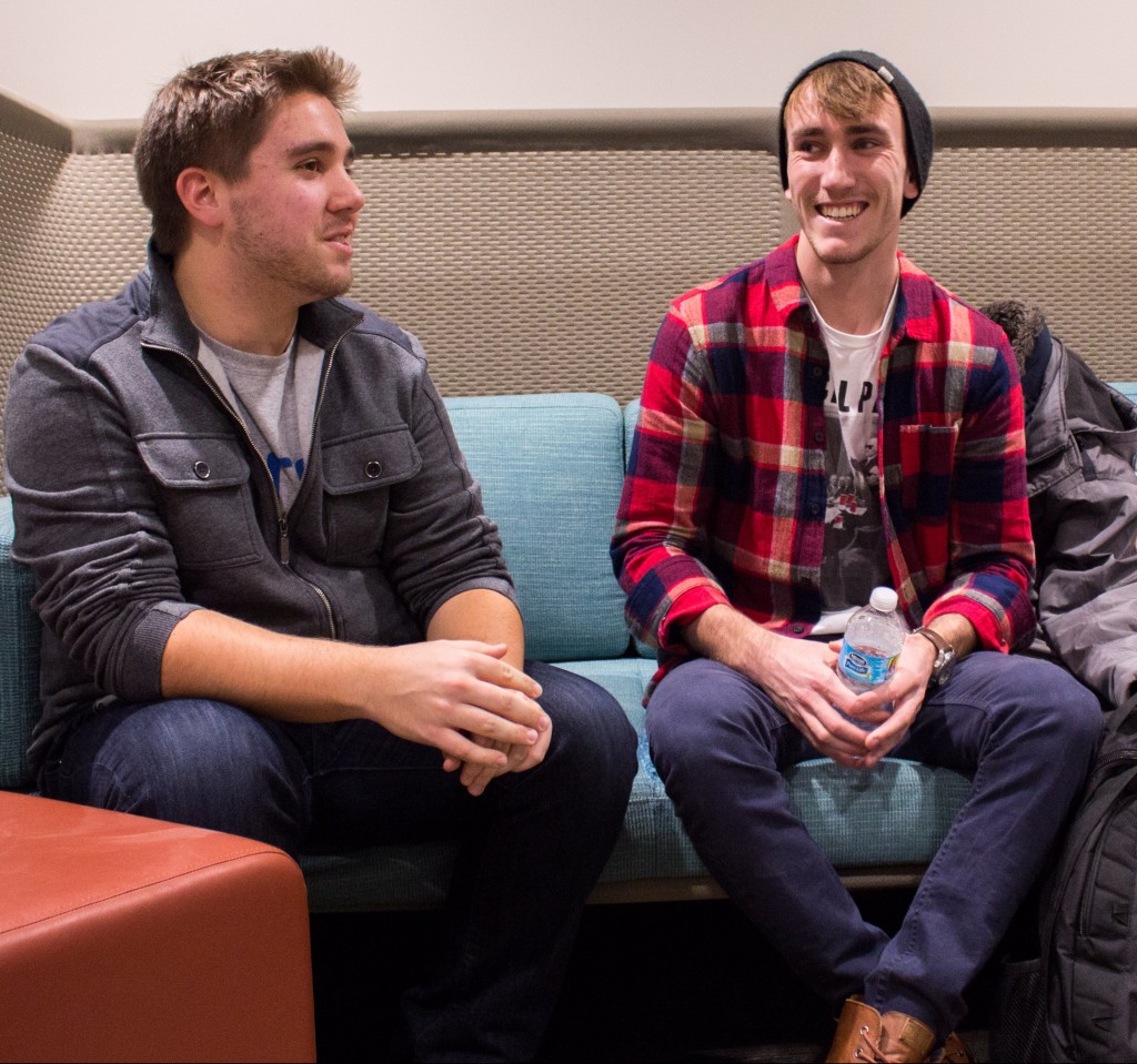 Advertising junior Adam Crookston and advertising senior Austin Syrek chat at an AdGroup meeting.