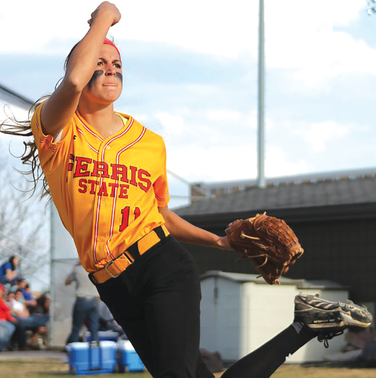Ferris junior pitcher Megan HIler warms up in the bullpen before a game in the 2015 season.