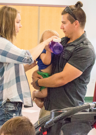 Ferris marketing sophomore and father of two, Todd Jones (right) understands the challenges of balancing being a student and a parent.