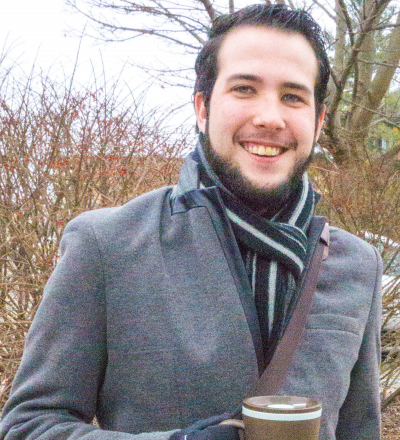 Logan Wyse, Ferris architecture sophomore, is ready for winter, sporting a peacoat with a neutral scarf.